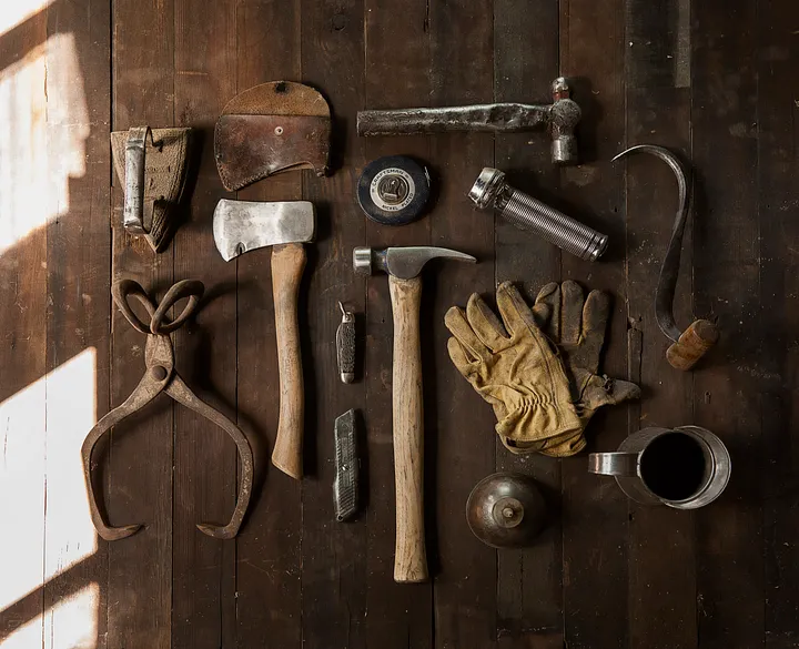 Hand tools arranged for careful restoration work