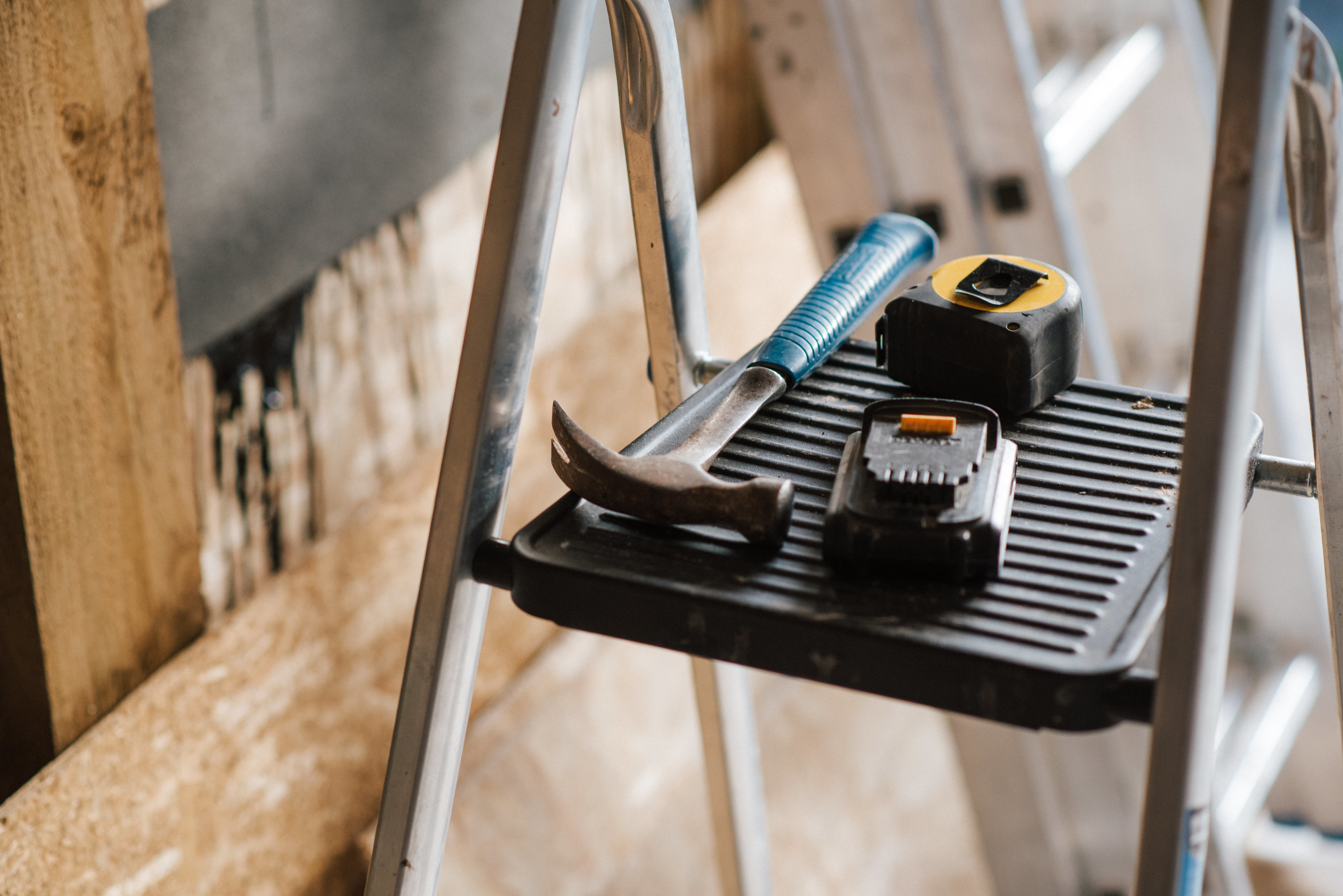 Hammer and measuring tools ready for home repairs